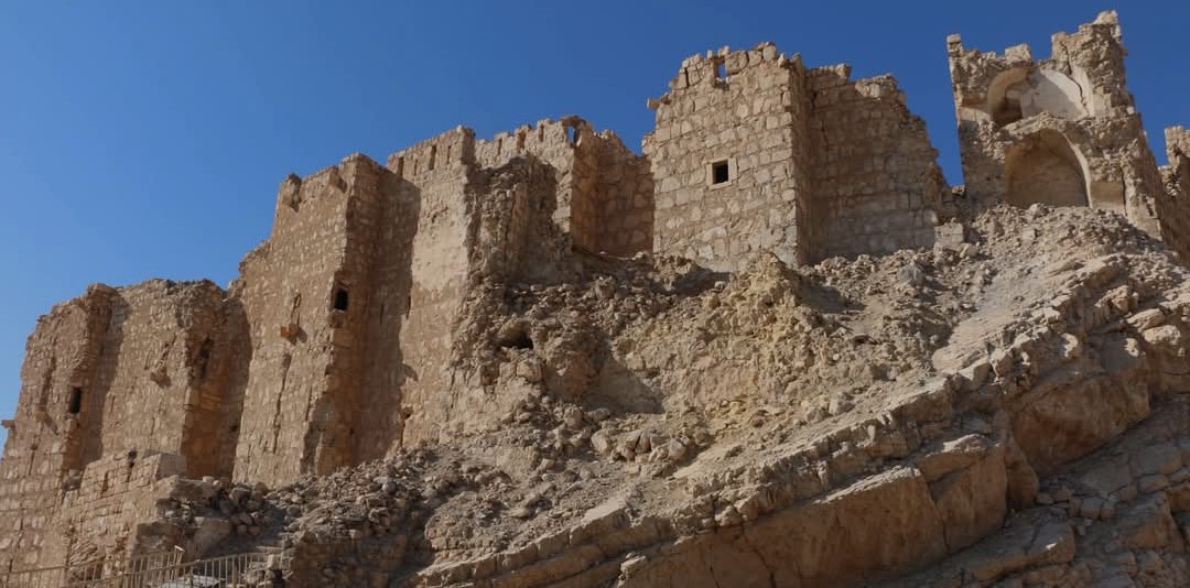 Figure 6: Photos of Palmyra Citadel before and after the bombing. Photo by Hasan Ali 2006, Mohamed Fares 2025